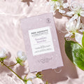 Pedi Moments Jasmine Soothe on a water background with white flowers.