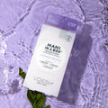 Lavender Relieve Mani in a Box on purple background with water