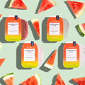 Image shows VOESH Watermelon Burst Pedi in a Box 4 Step in pink background with water and watermelon slices