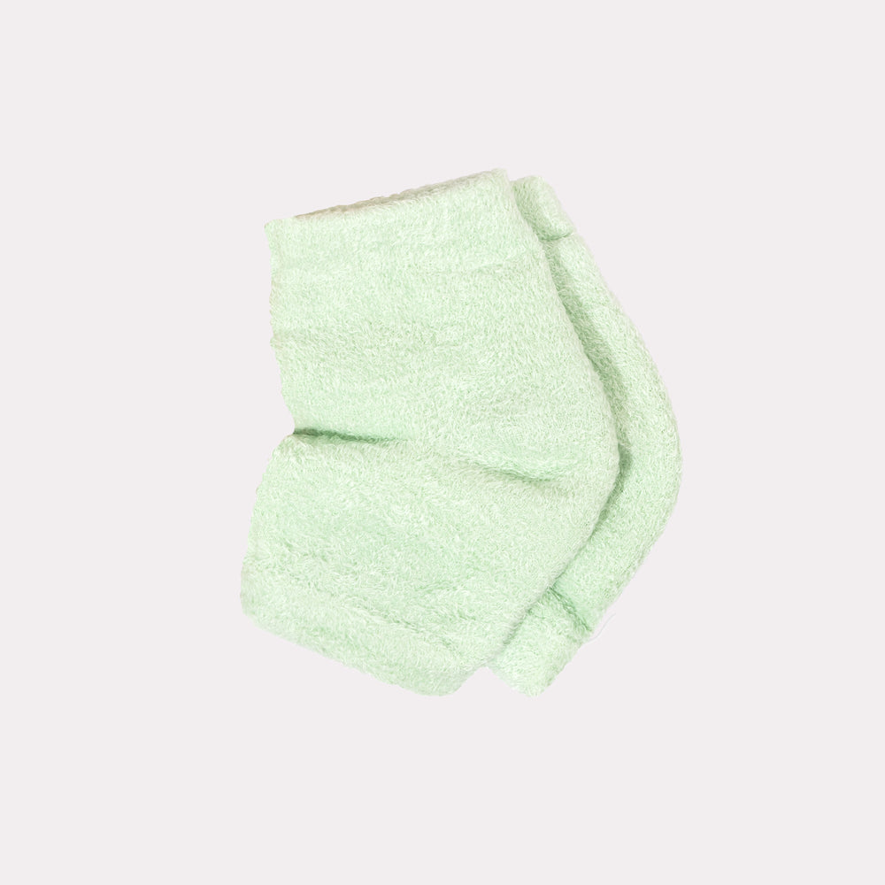 Voesh moisturizing heel sock on a counter