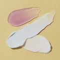 texture of scrub, mud masque, massage lotion on yellow background