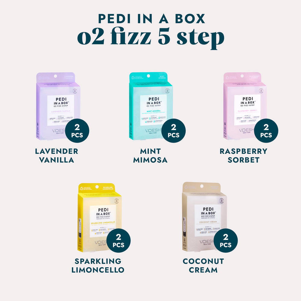 Pedi in a Box O2 Fizz 5 Step Lavender Vanilla, Pedi in a Box O2 Fizz 5 Step Mint Mimosa, Pedi in a Box O2 Fizz 5 Step Sparkling Limoncello, and Pedi in a Box O2 Fizz 5 Step Coconut Cream on a grey background.