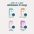 Pedi in a Box Ultimate 6 Step Aloe Aloe, Pedi in a Box Ultimate 6 Step Milk & Honey, Pedi in a Box Ultimate 6 Step Sage Fullness, and Pedi in a Box Ultimate 6 Step Wild Black Plum on a grey background.