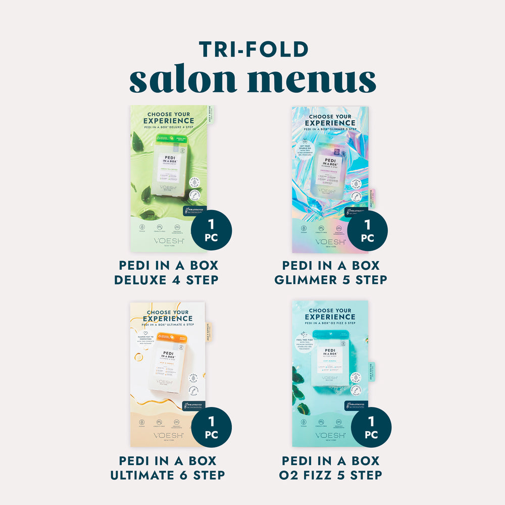 Image of four different tri-fold salon pedicure menus on a grey background.