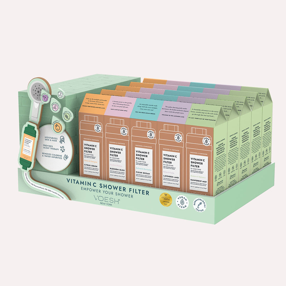 Vitamin C Shower Filter Display Kit filled with 25 Vitamin C Shower Filters (5 Lavender Land, 5 Citrus Crush, 5 Blossom Bliss, 5 Clean Ocean, & 5 Rainforest Mist) on a white background.
