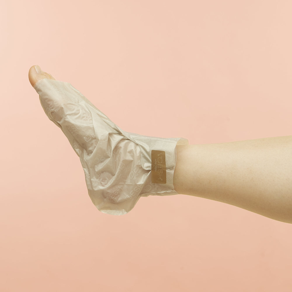 Woman wearing Collagen Socks tip removed
