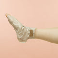 Woman wearing Collagen Socks tip removed