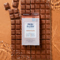 Chocolate Love 4 Step on a chocolate bar in the water