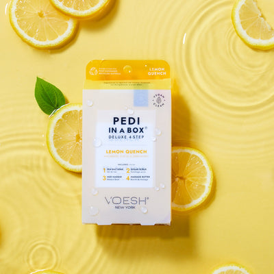 Lemon Quench pedi in a box 4 step in water on yellow background with lemon slices