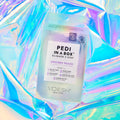 Pedi In a Box Glimmer Unicorn Peach on iridescent background
