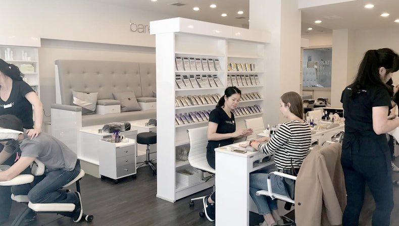 woman getting manicure at BareLuxury