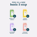 Pedi in a Box Basic 3 Step Green Tea Detox, Pedi in a Box Basic 3 Step Lemon Quench, Pedi in a Box Basic 3 Step Lavender Relieve, and Pedi in a Box Basic 3 Step Vitamin Recharge on a grey background.