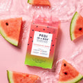 Image shows VOESH Watermelon Burst Pedi in a Box 4 Step in pink background with water and watermelon slices