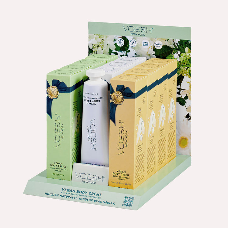 VOESH Vegan Body Crème Display Kit, stocked with Tangerine Glow, Lavender Land, and Green Tea moisturizing hand creams, in front of a white background.