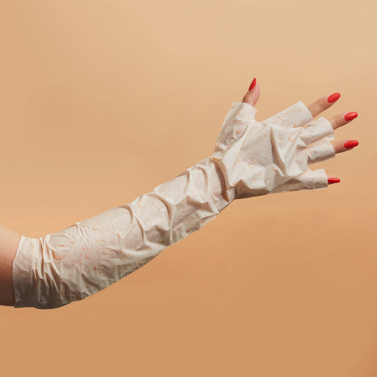 Women arm wearing Youth Therapy Elbow High Gloves finger tip removed