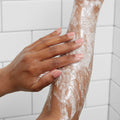 Closeup of woman's arm with sugar scrub